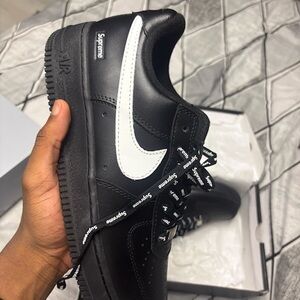 Supreme Black Sneakers with White Swoosh